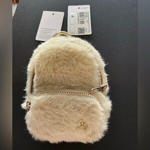 SOLD OUT color Lululemon cream nano backpack plush w gold accents crystal logo✨